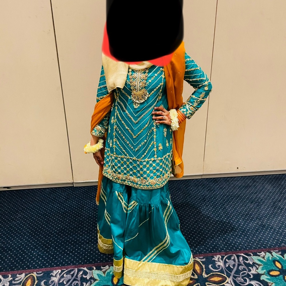 In very good condition only one time wear two piece dress